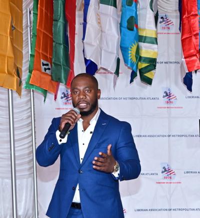 Dr. Glay speaking at the Liberian Association of Metropolitan Atlanta event